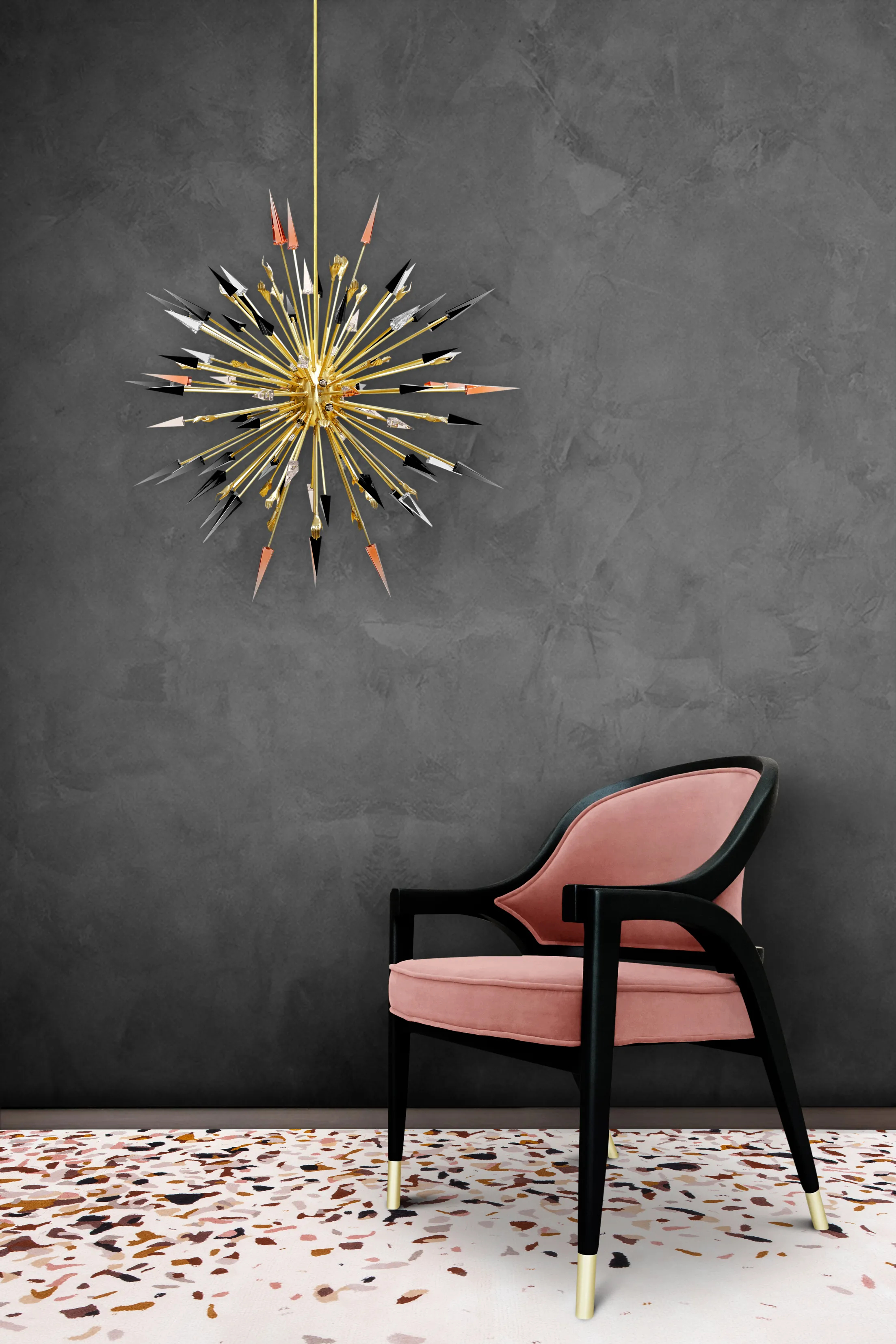 Image of an Arendal Chair by KKbyKOKET, featuring a close-up view of its elegant pink upholstery and intricate gold details, perfectly complemented by the powerful Outburst Chandelier, featuring black, gray, clear and pink shooting arrows.