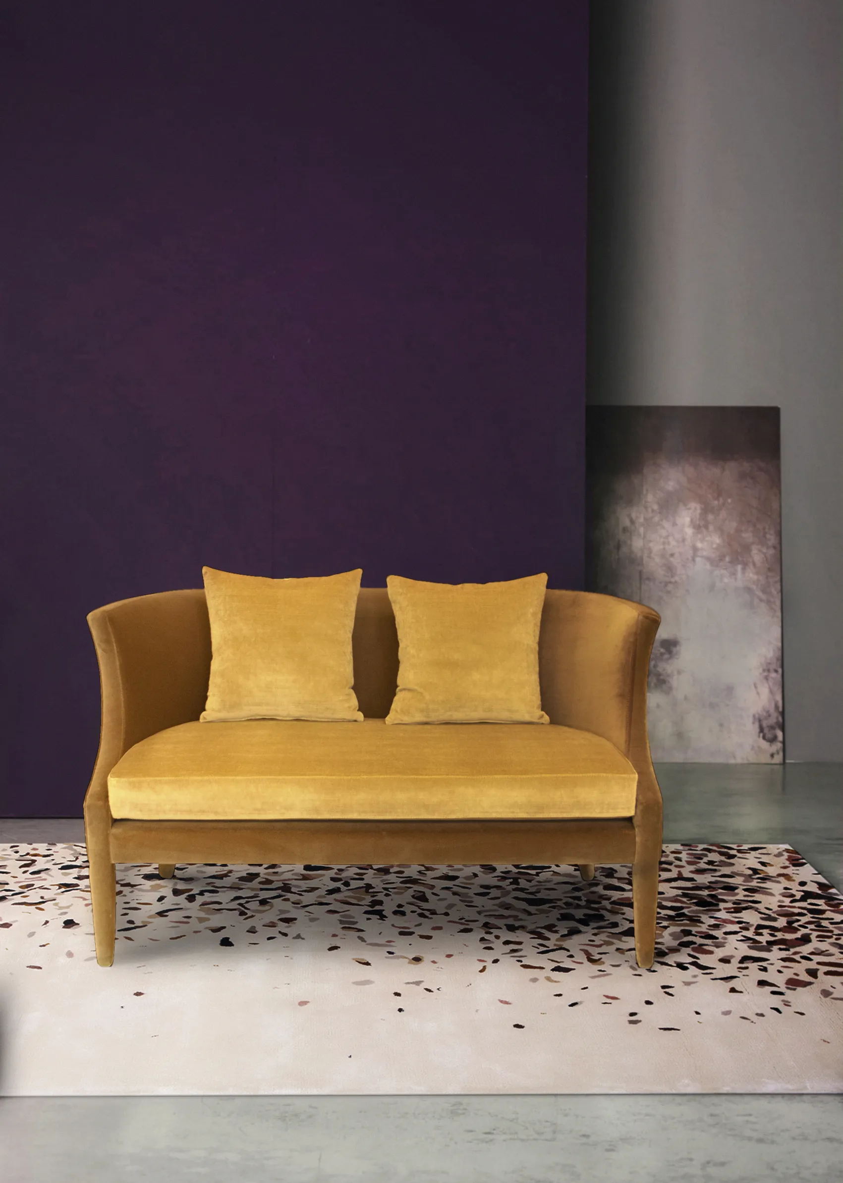 Interior design project featuring the Athina Sofa, fully upholstered with a luxurious yellow fabric. The purple background and patterned rug settle the perfect contrast for this luxury piece of furniture.