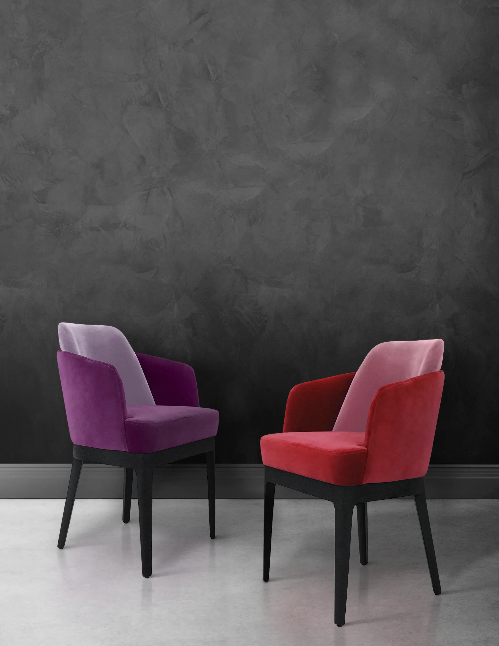 Two London Dining Chairs by KKbyKOKET, featuring luxurious colorful upholstery and elegantly handmade black lacquer legs. Each chair features different tones of purple and pink, and the grey background settles the perfect contrast.