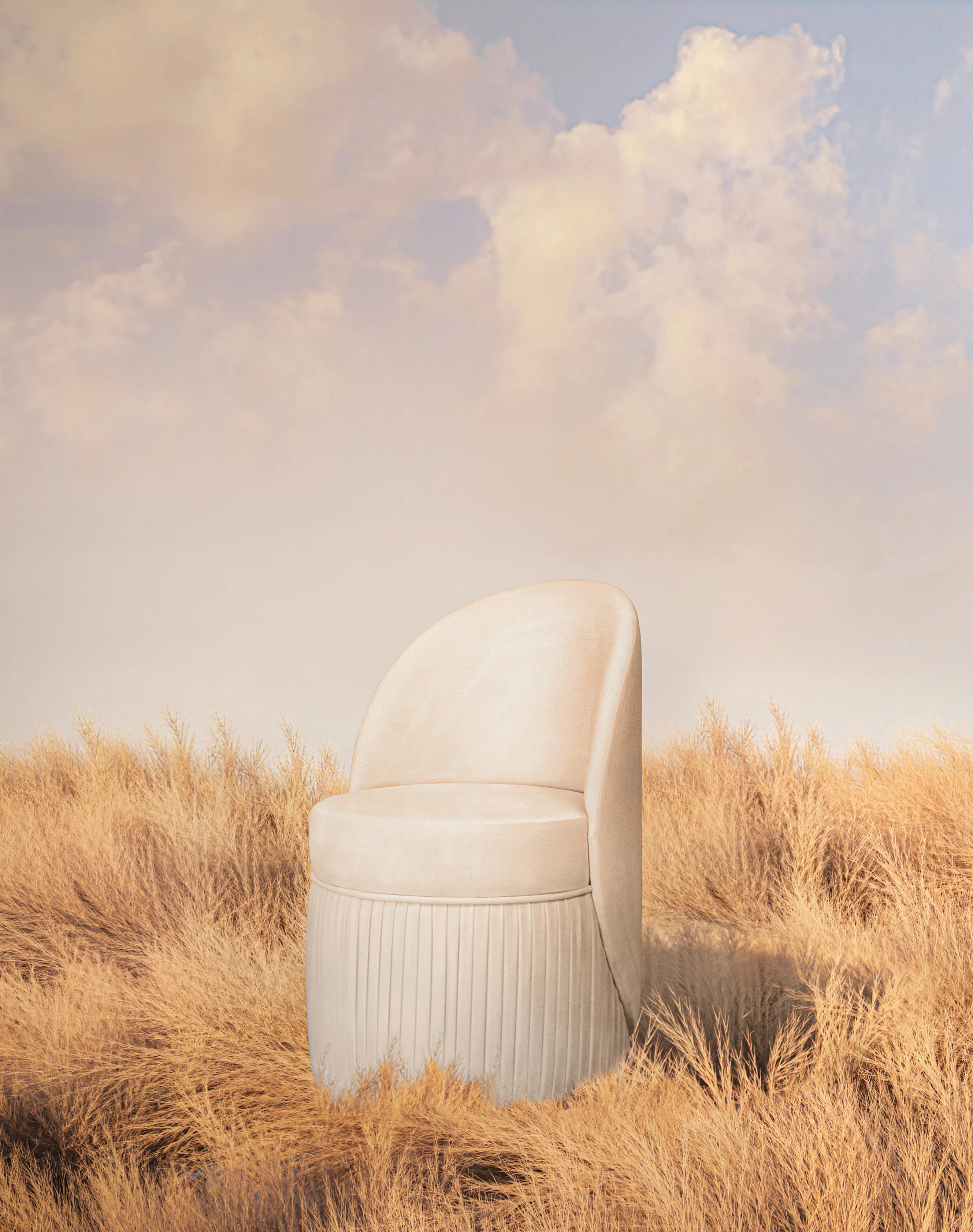 Luxury Venice Chair by KKbyKOKET with white upholstery, displayed in a natural wheat field. As the background, a beautiful sunset with warm colors, creating a peaceful and tranquil atmosphere.