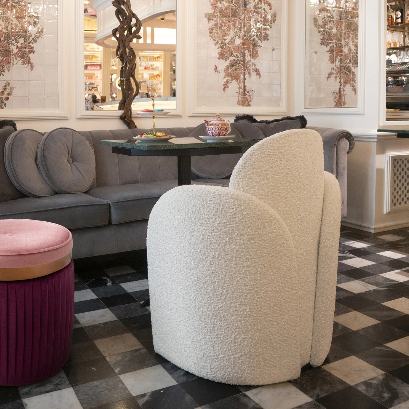 Oh-Lá-Lá chair by KKbyKoket in a luxurious living room setting, showcasing its unique shape and soft, textured upholstery.