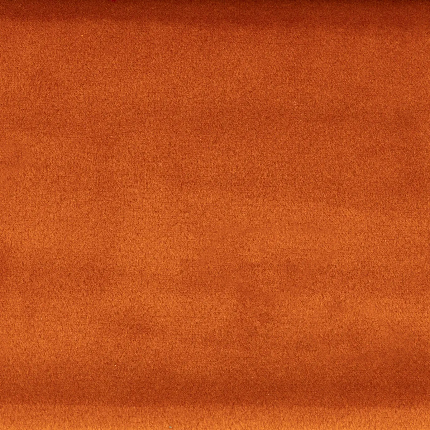 Milano 022 fabric in a burnt orange tone with a soft texture, ideal for furniture upholstery and interior decoration with a cozy and sophisticated touch.